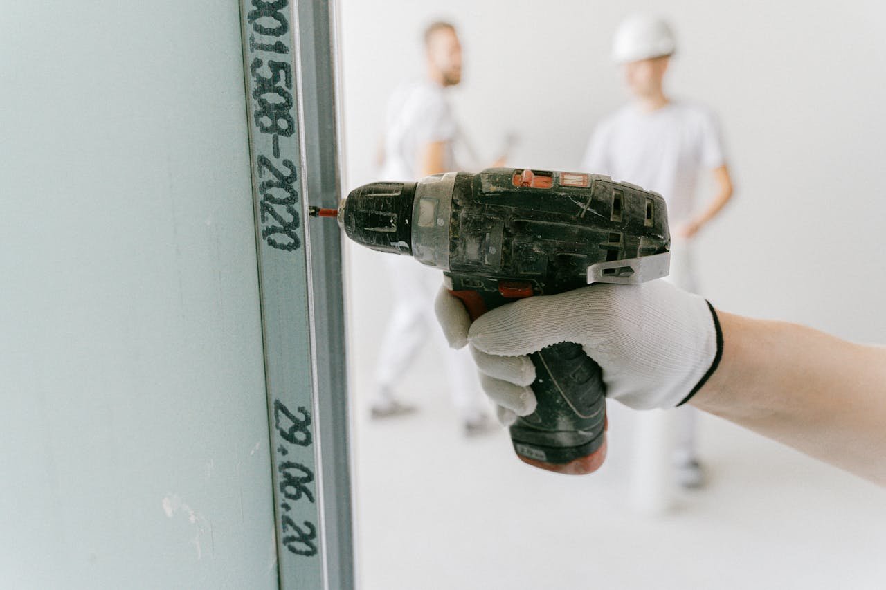 Professional drywall contractor at work